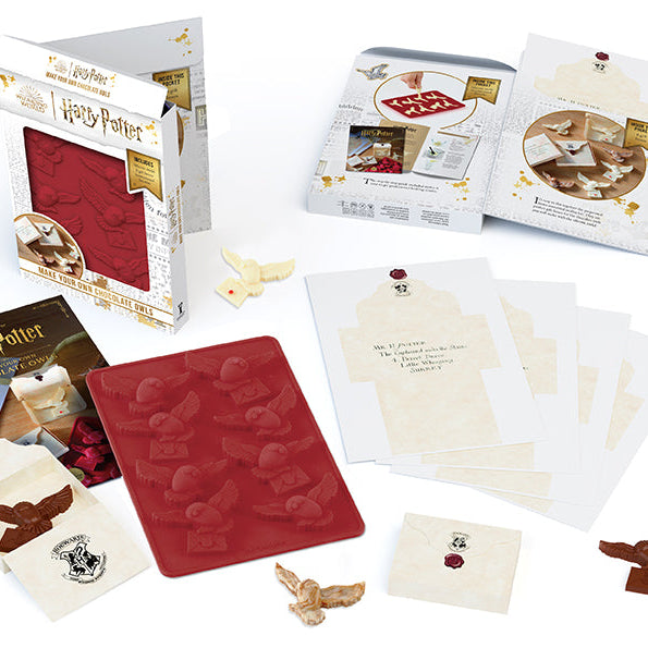 Harry Potter Make Your Own Chocolate Owls kit by Insight Editions with chocolate owl molds and decorating supplies.