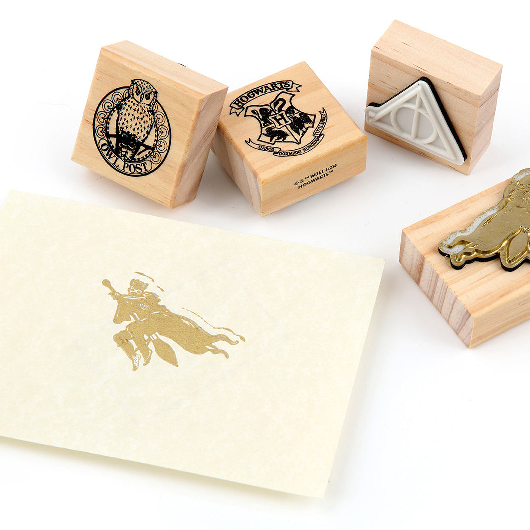 Harry Potter Welcome to Hogwarts rubber stamp set by Insight Editions featuring magical designs for crafting and stationery projects.