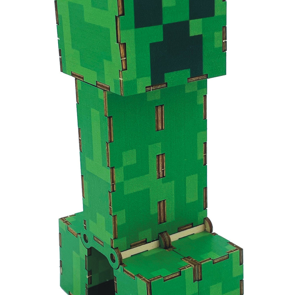 Minecraft Creeper 3D Wood Model kit by Insight Editions featuring assembled green wooden Creeper figure.