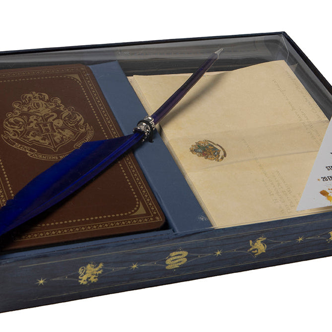 Harry Potter Hogwarts stationery set with pen, featuring wizard-themed notepads, sticky notes, and decorative stationery items.