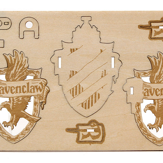 Harry Potter Ravenclaw IncrediBuilds Emblematics kit featuring stationery and collectible elements from Insight Editions.