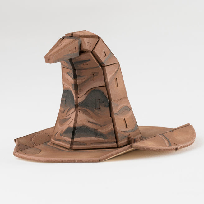 Insight Editions IncrediBuilds Harry Potter Sorting Hat 3D wood model kit with a book, perfect for gift and stationery enthusiasts.