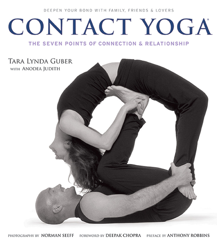 Softcover Contact Yoga book by Insight Editions featuring illustrations and instructions for yoga practices.
