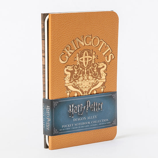 Set of three Harry Potter Diagon Alley softcover pocket notebooks from Insight Editions, featuring magical cover designs.