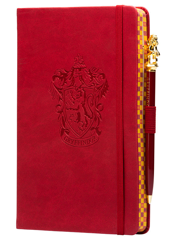 Gryffindor Harry Potter softcover journal with pen, featuring classic Hogwarts house crest and detailed cover design.