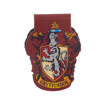 Inside view of Harry Potter Gryffindor notebook and page clip set by Insight Editions, featuring gold-embossed Gryffindor crest and lined pages.