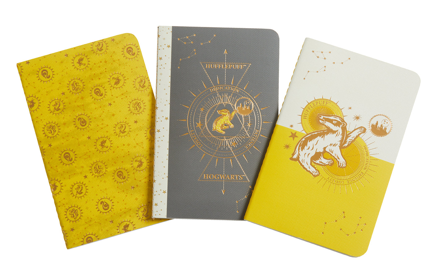 Set of three Harry Potter Hufflepuff constellation sewn pocket notebooks by Insight Editions, softcover with magical-themed covers.
