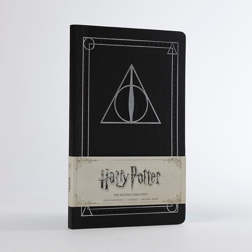 Softcover Harry Potter Deathly Hallows ruled notebook by Insight Editions with magical cover design.