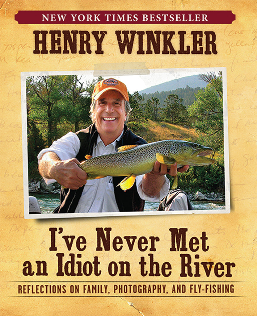 Softcover copy of "I've Never Met an Idiot on the River" by Insight Editions, featuring a colorful river scene on the cover.