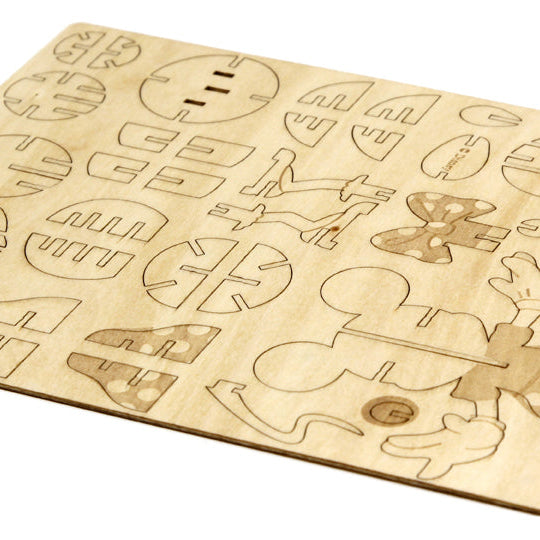 Softcover IncrediBuilds Disney Minnie Mouse book with 3D wood model, featuring colorful illustration and detailed craft components.