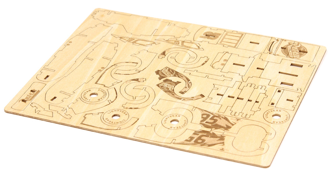 Softcover book and 3D wood model of Lightning McQueen from Disney Pixar Cars 3 by Insight Editions