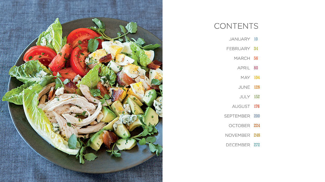 Softcover "Salad of the Day" cookbook by Insight Editions, featuring fresh salad recipes on the cover.