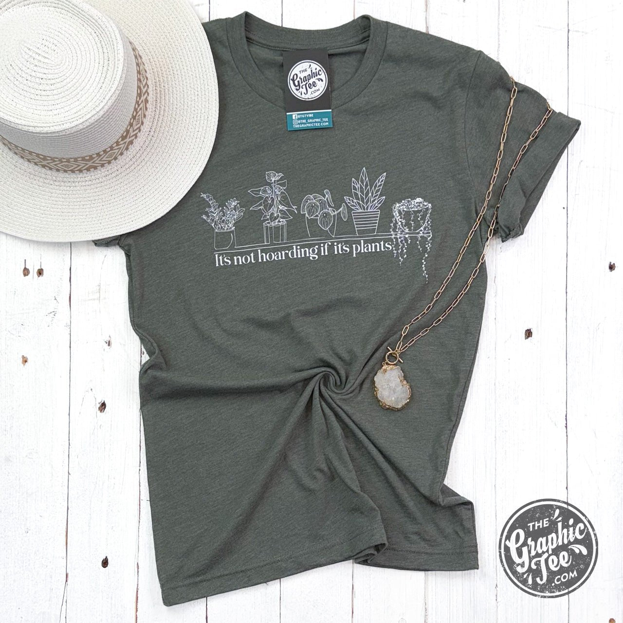 Heather military green short sleeve graphic tee featuring "It's Not Hoarding If It's Plants" motto from The Graphic Tee.