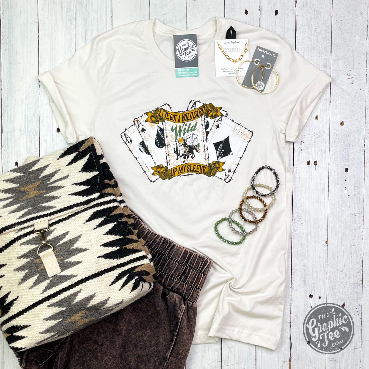 Vintage white short sleeve graphic tee by The Graphic Tee with "I've Got A Wild Card" design, unisex fit, casual style.