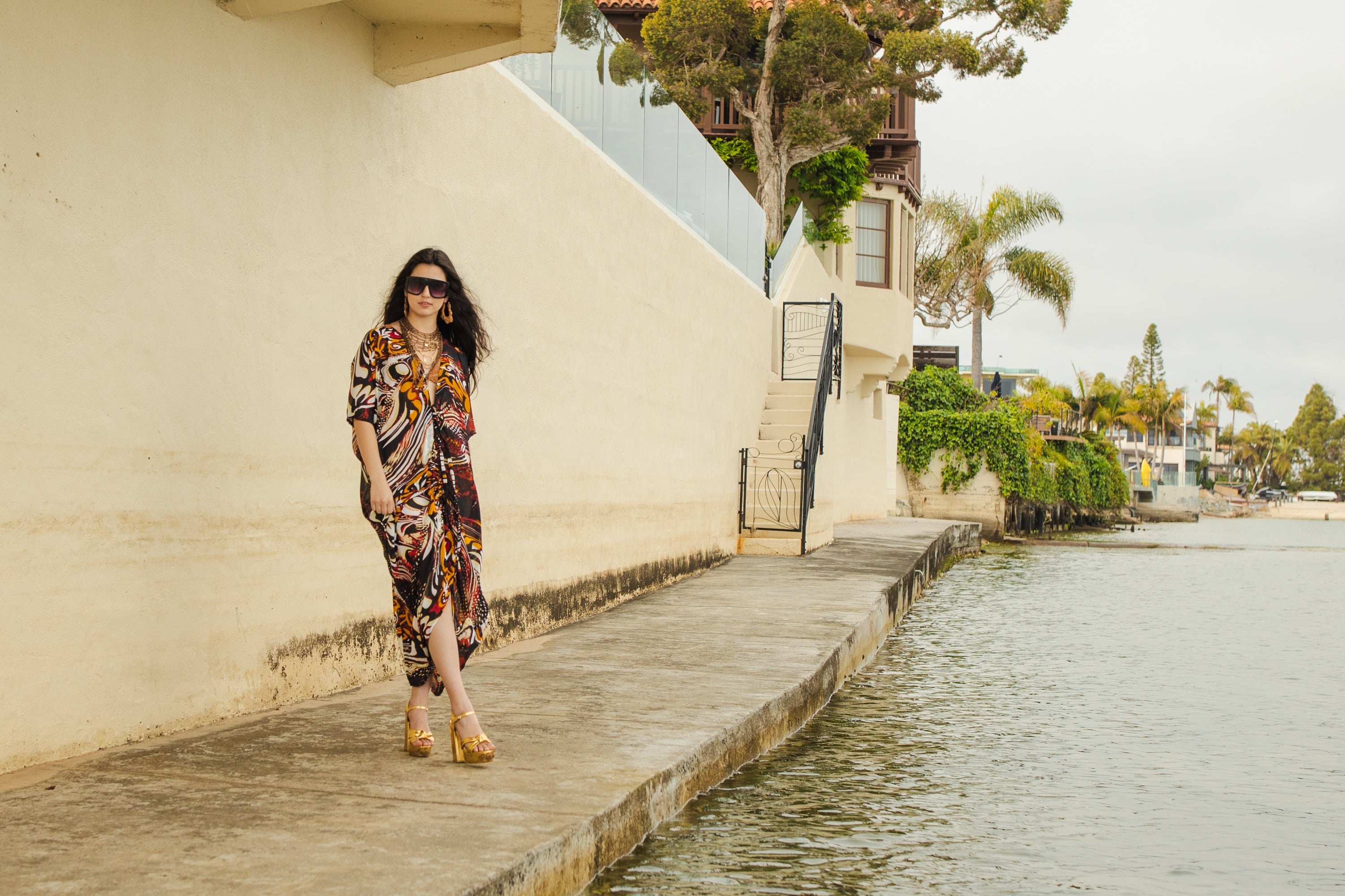 Handmade Jennafer Grace Actius Kaftan Dress in vibrant rouge, featuring flowing fabric and elegant design.