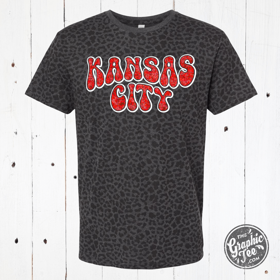 Unisex Kansas City Glitter Leopard graphic T-shirt from The Graphic Tee, featuring a vibrant glitter leopard design.