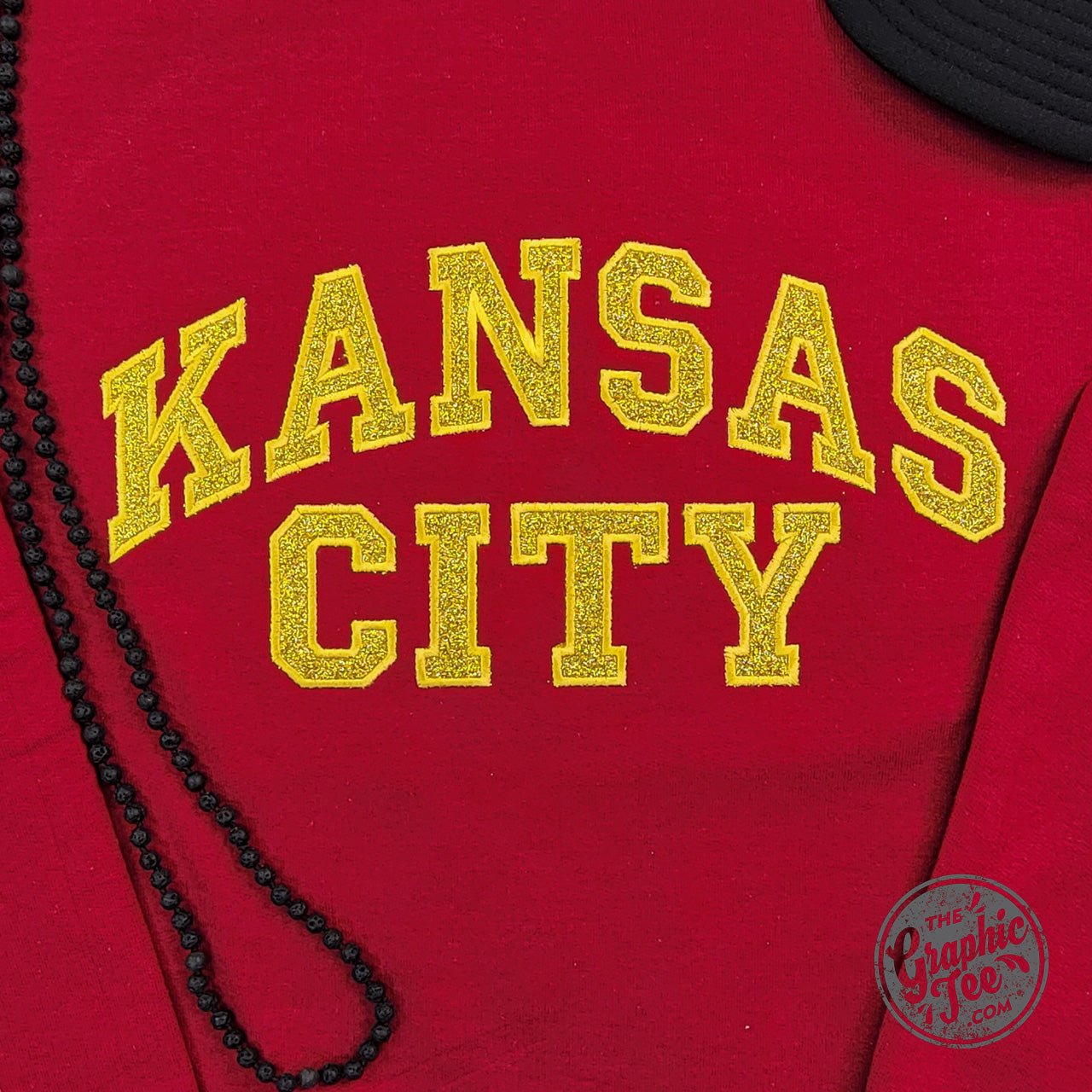 Dark red Kansas City Gold Glitter Applique crewneck sweatshirt by The Graphic Tee, featuring a stylish Kansas City graphic design.