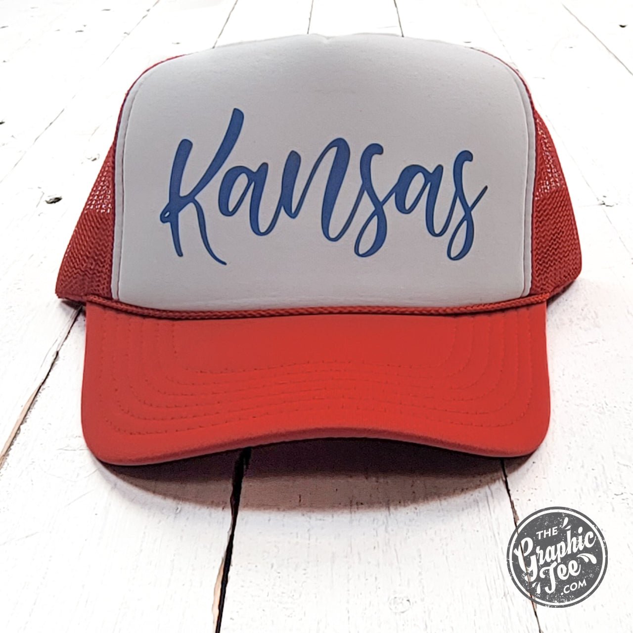 Kansas Red and White Foam Trucker Cap featuring a classic trucker style with breathable mesh and bold team colors.