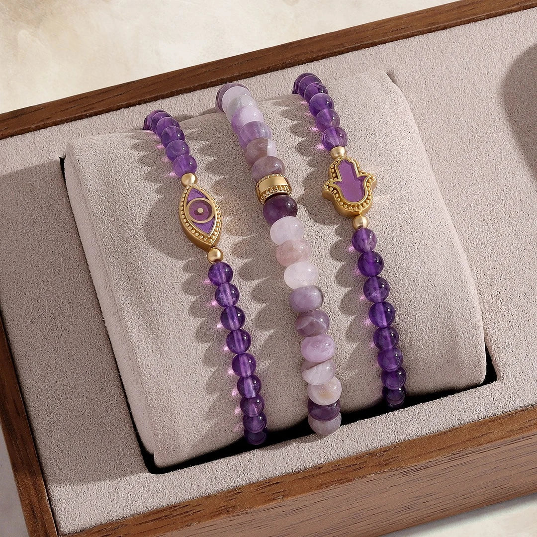 Women's Calm Spirit Amethyst and CZ gold bracelet by Karma and Luck featuring purple amethyst stones and sparkling cubic zirconia accents.