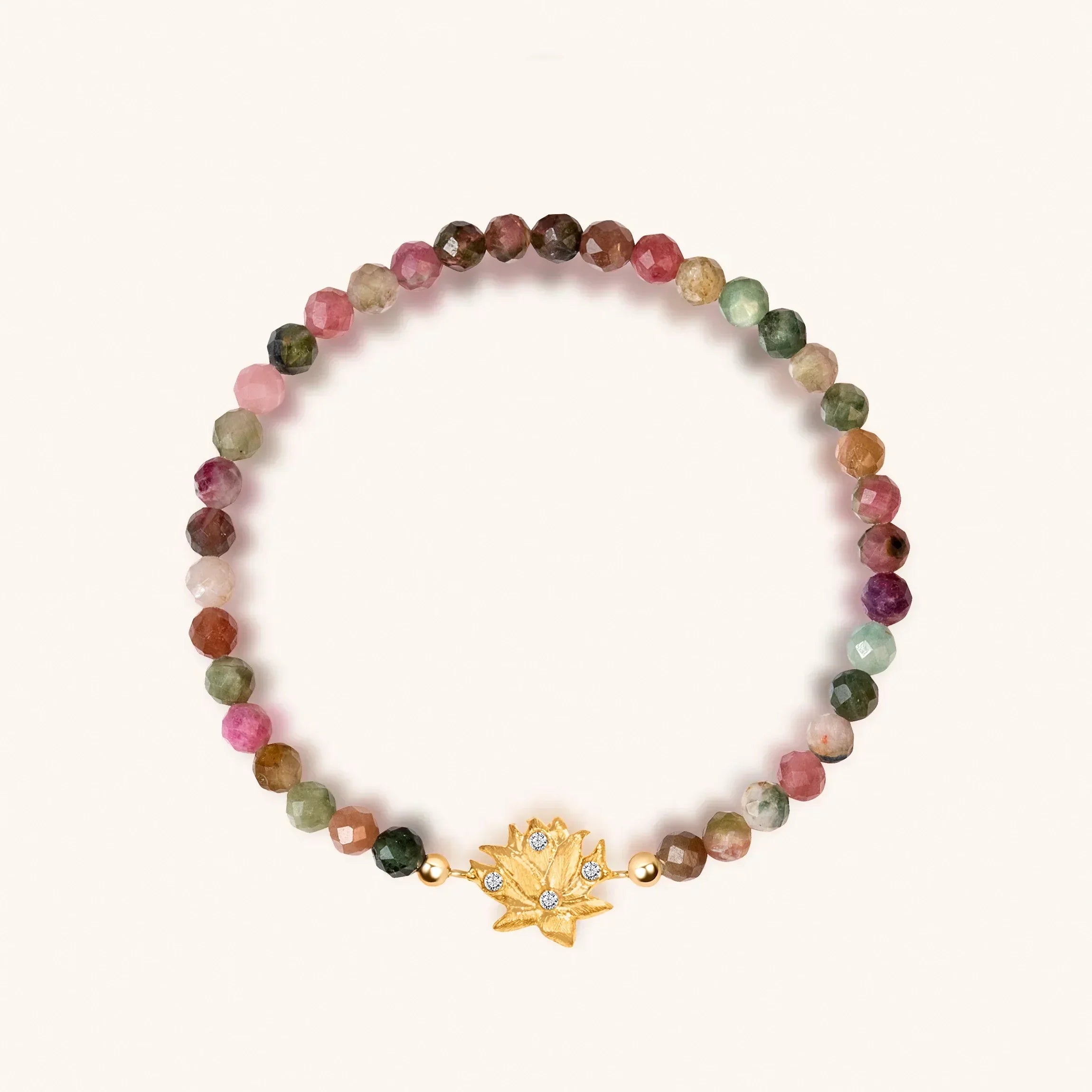 Gold plated Lotus Blossom tourmaline bracelet for women by Karma and Luck, featuring intricate floral design and colorful gemstone accents.