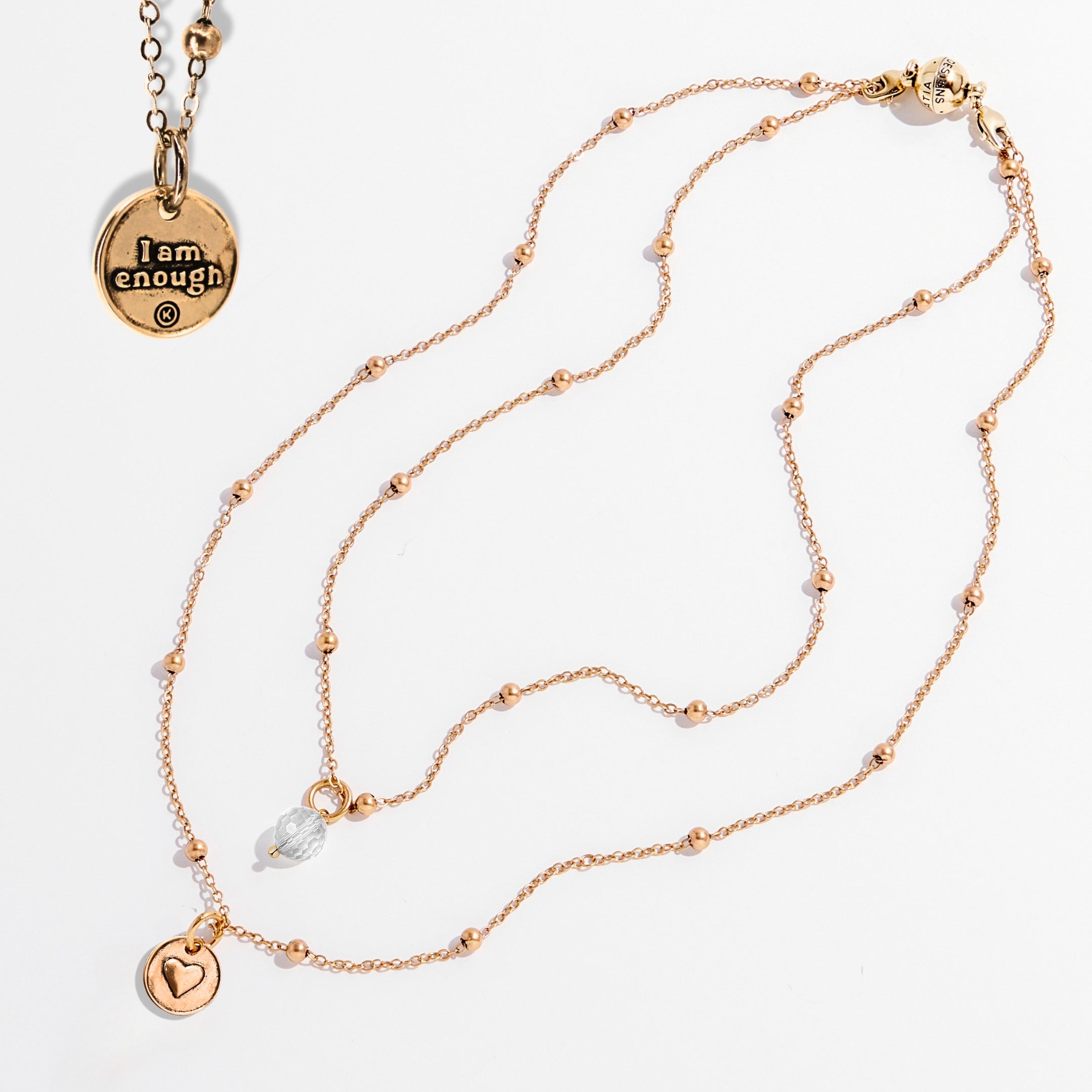 Katia Designs dainty gold heart necklace with black lip pearl and "I Am Enough" charm, elegant jewelry for everyday wear.