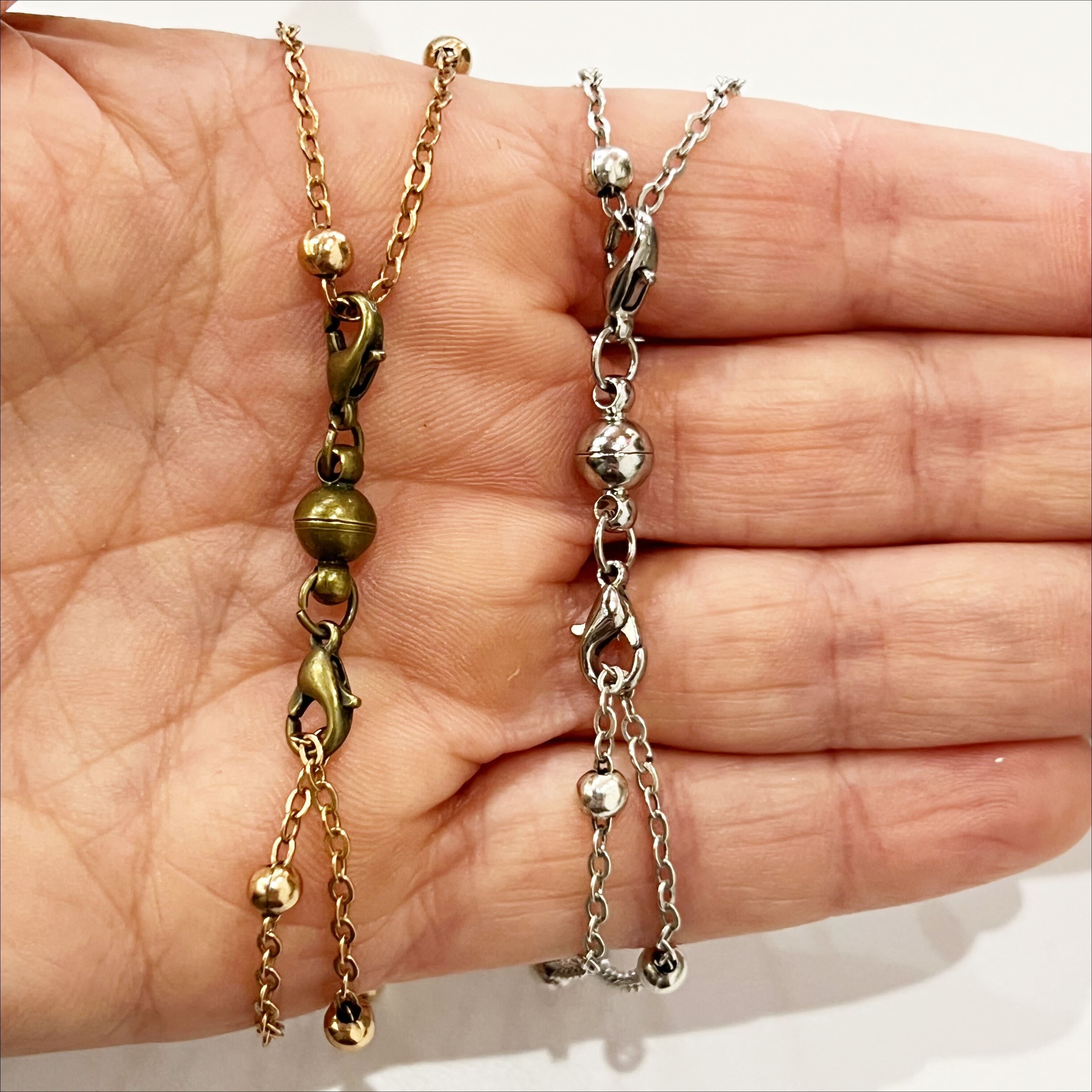 Katia Designs I Am Enough Heart Dainty Necklace with black lip pearl pendant in antique gold finish, delicate and stylish jewelry piece.