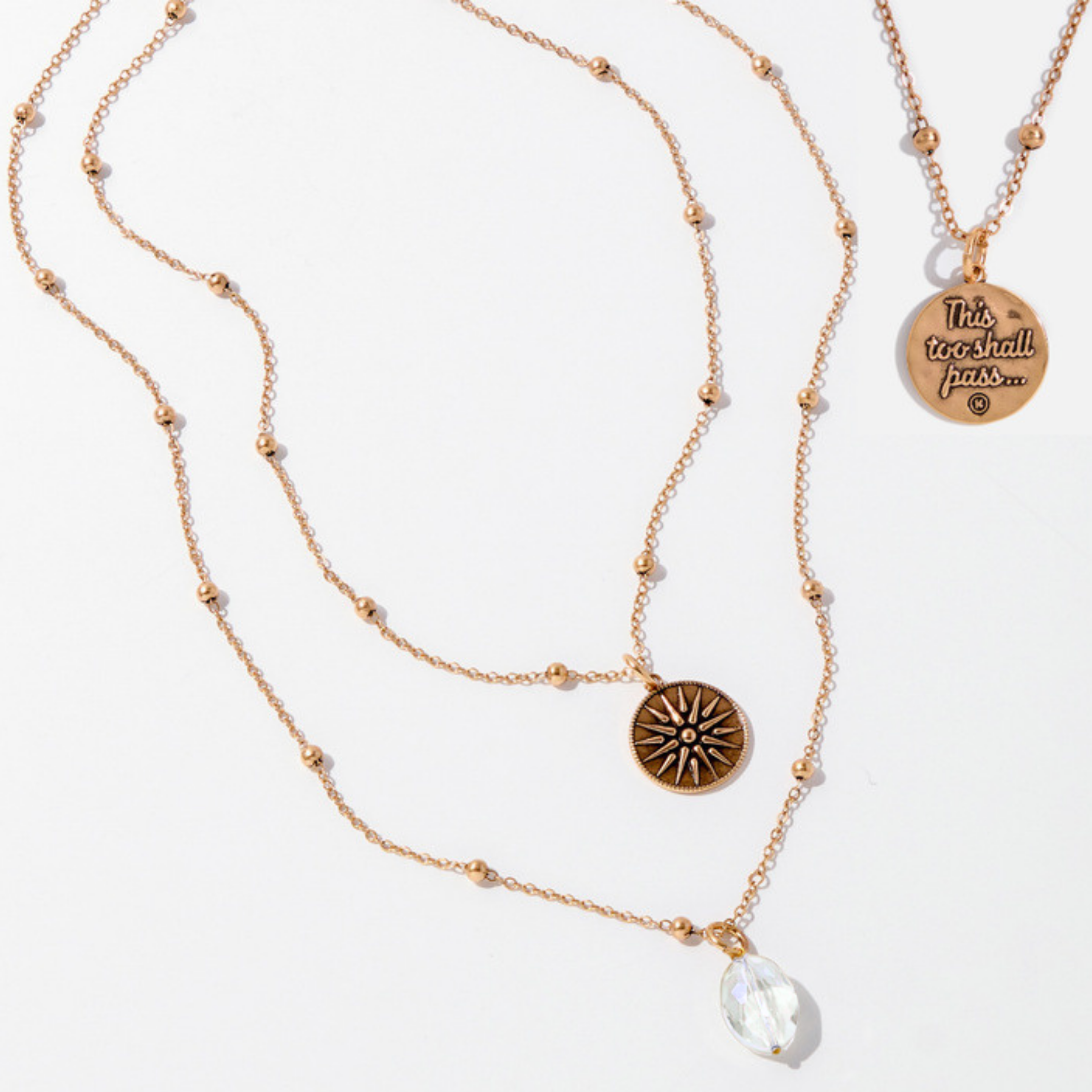 Dainty silver "This Too Shall Pass" star necklace by Katia Designs, featuring a delicate chain and star pendant.