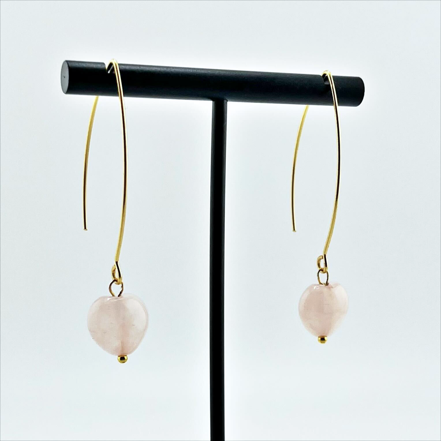 Small stone drop earrings by Katia Designs featuring antique gold finish and crystal quartz stones.