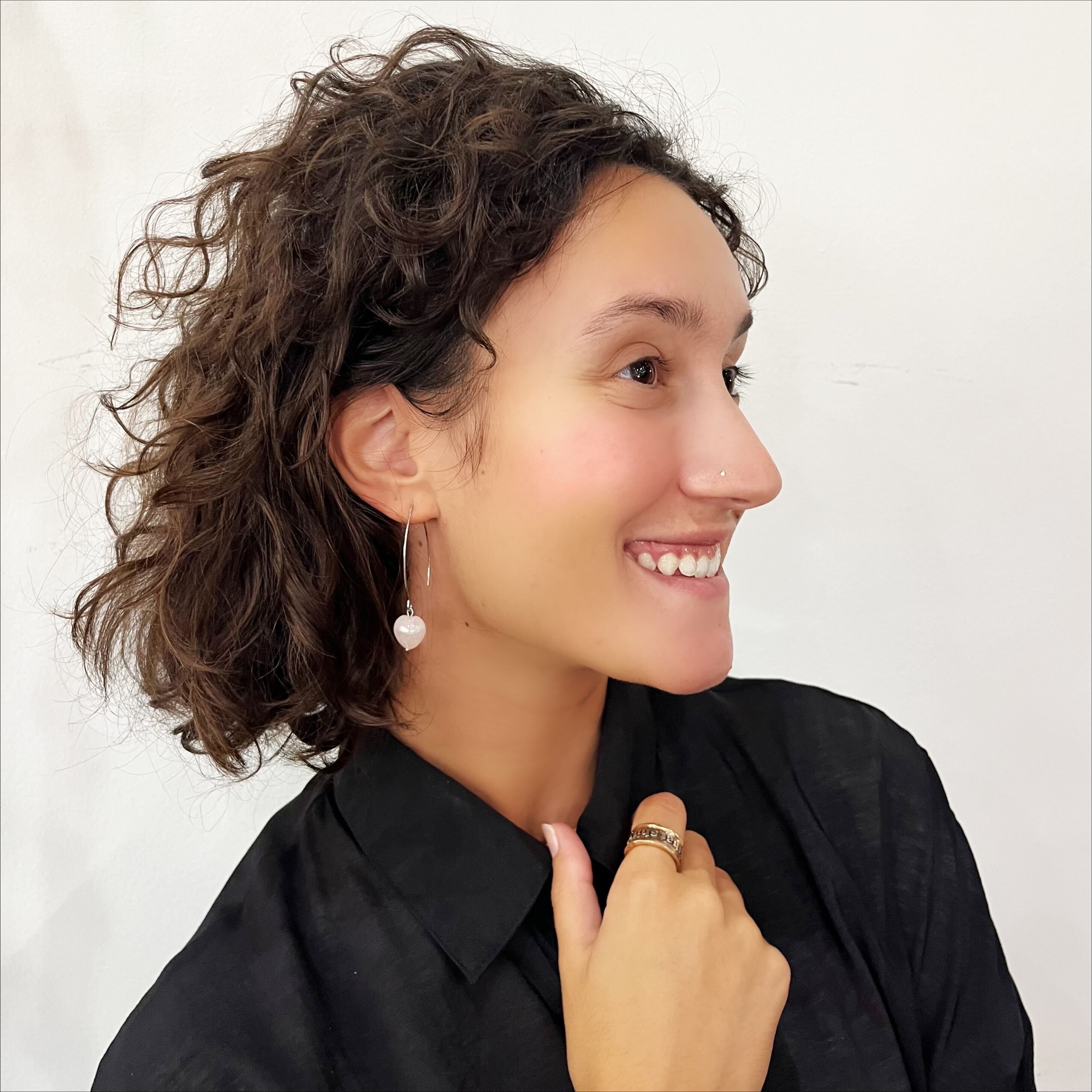 Katia Designs small stone drop earrings with antique gold finish and crystal quartz accents, elegant jewelry for special occasions.