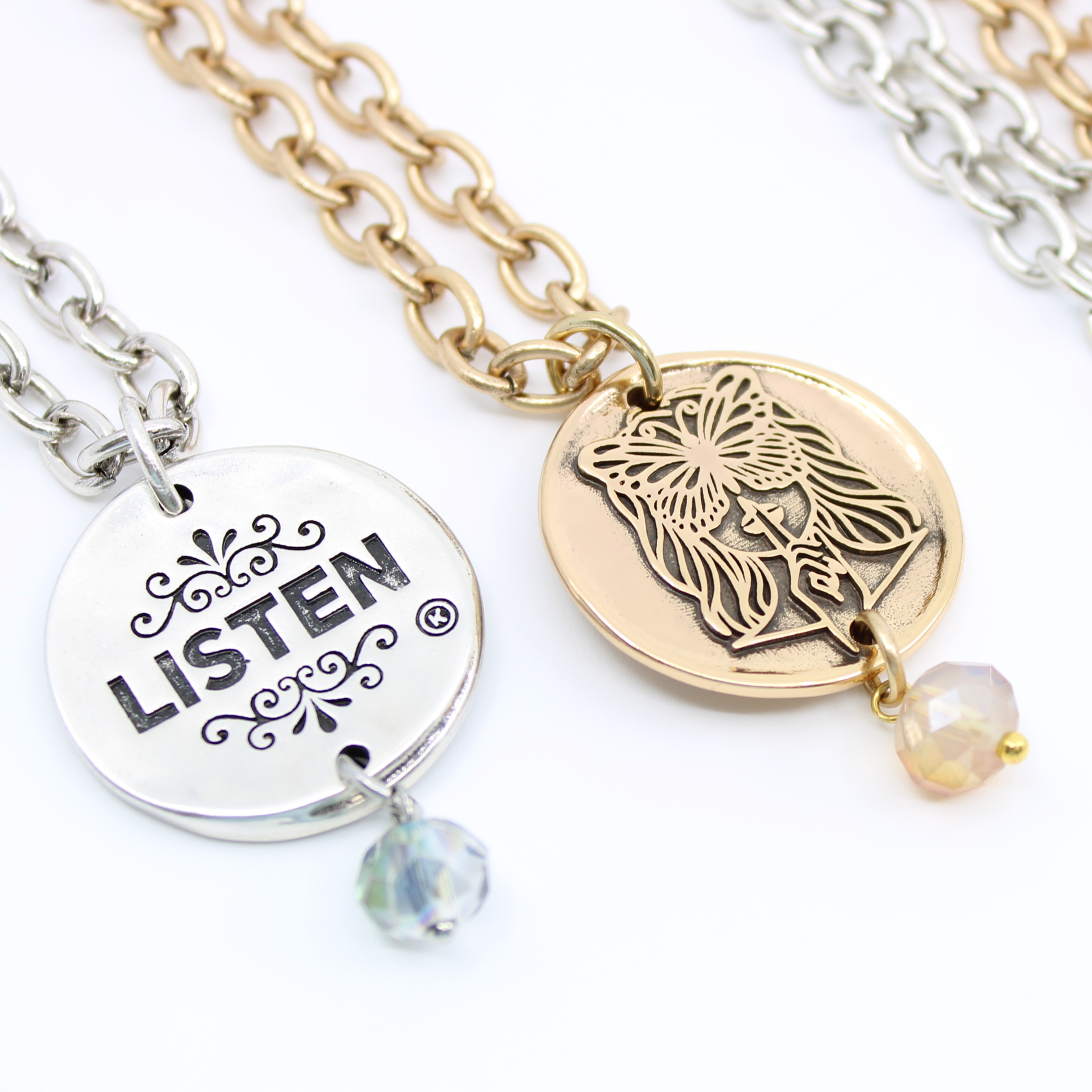 Katia Designs Listen Madame Butterfly Essential Necklace in antique gold, featuring delicate butterfly pendant on a fine chain.