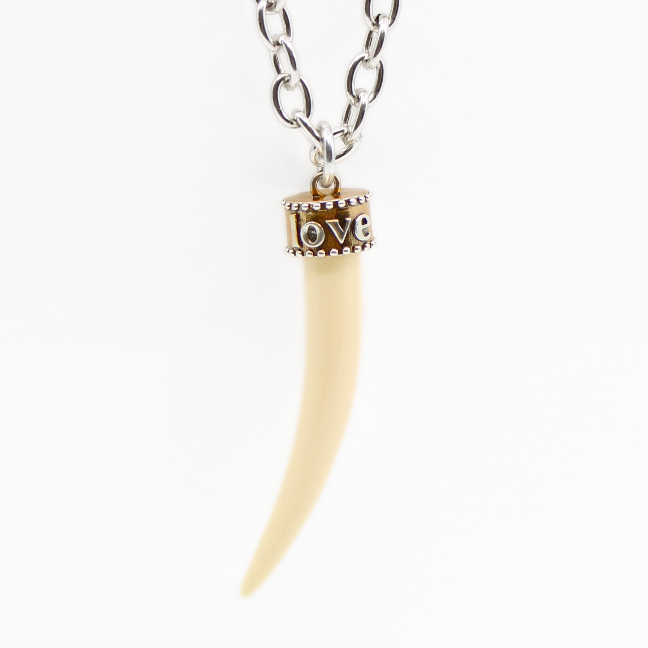 Katia Designs Love Tusk Essential Necklace in antique gold featuring a delicate tusk pendant on a fine chain.