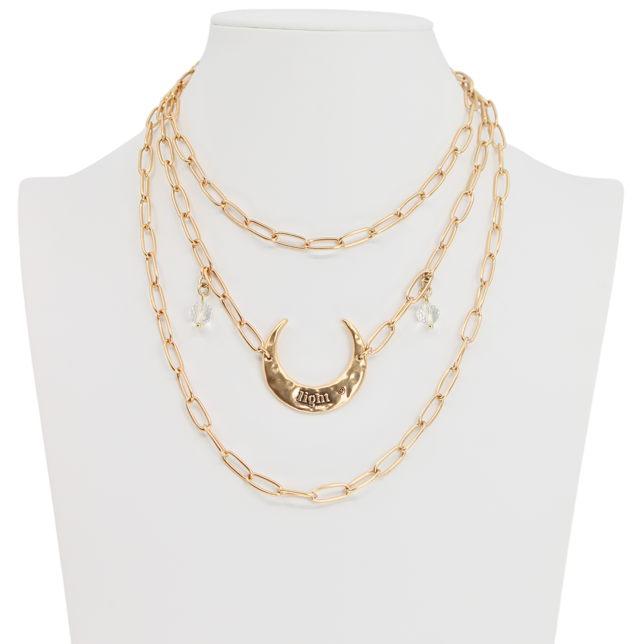 Katia Designs long chain necklace featuring a lightweight gold crescent moon pendant on an elegant antique gold chain.
