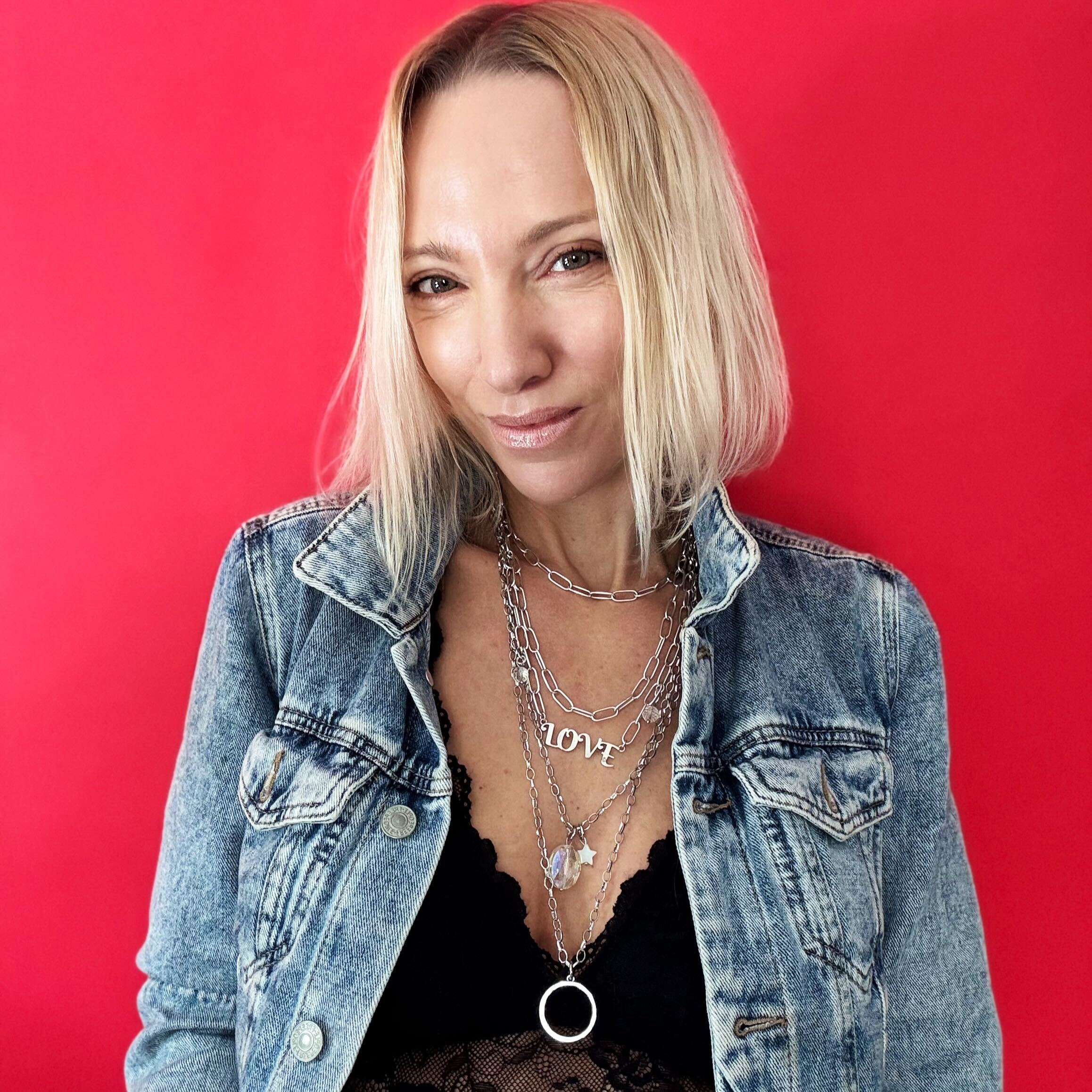 Katia Designs antique gold Love long chain necklace featuring a delicate pendant and elegant design.