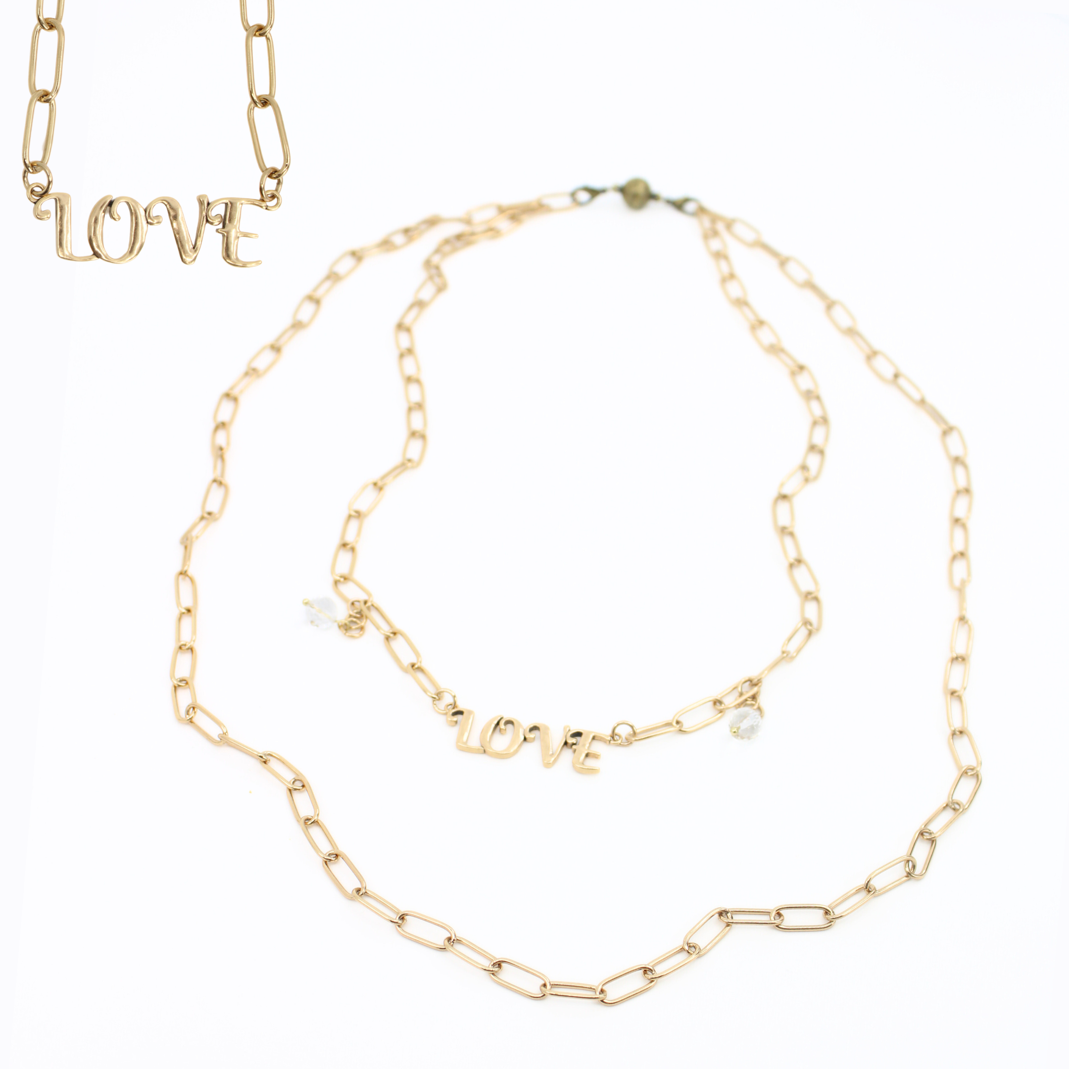 Katia Designs antique gold love long chain necklace with intricate link details, stylish and elegant jewelry accessory.