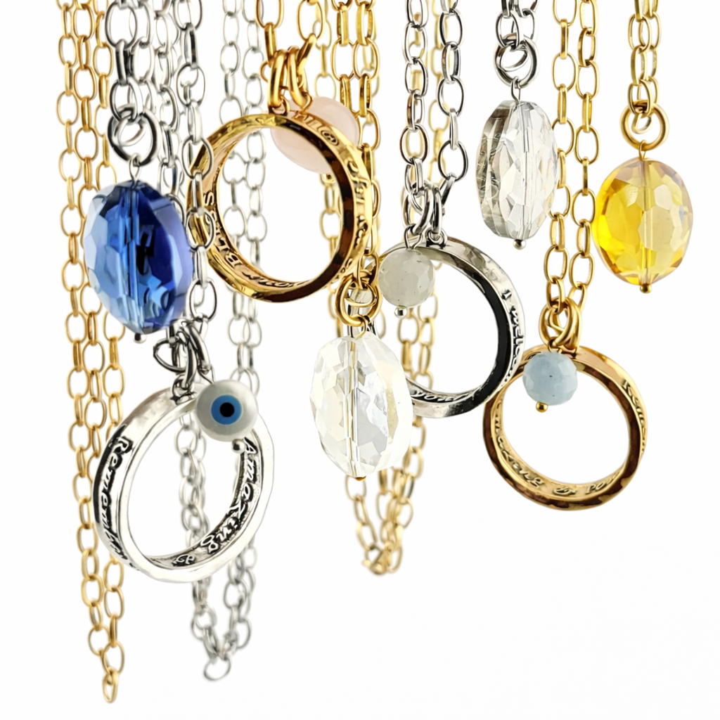 Katia Designs I Welcome Miracles ring necklace with antique gold finish and clear AB crystal accents, showcasing elegant jewelry design.