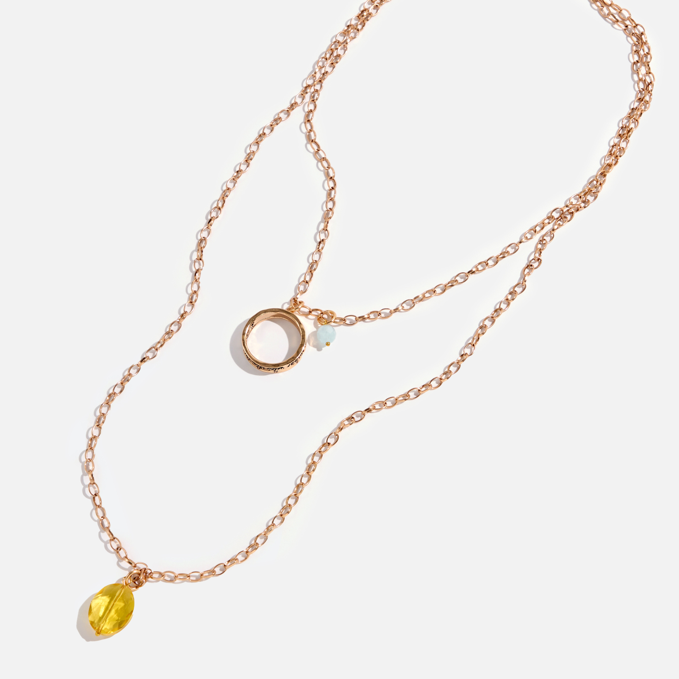 Katia Designs original antique gold necklace featuring a clear AB crystal ring with "I Welcome Miracles" inscription.
