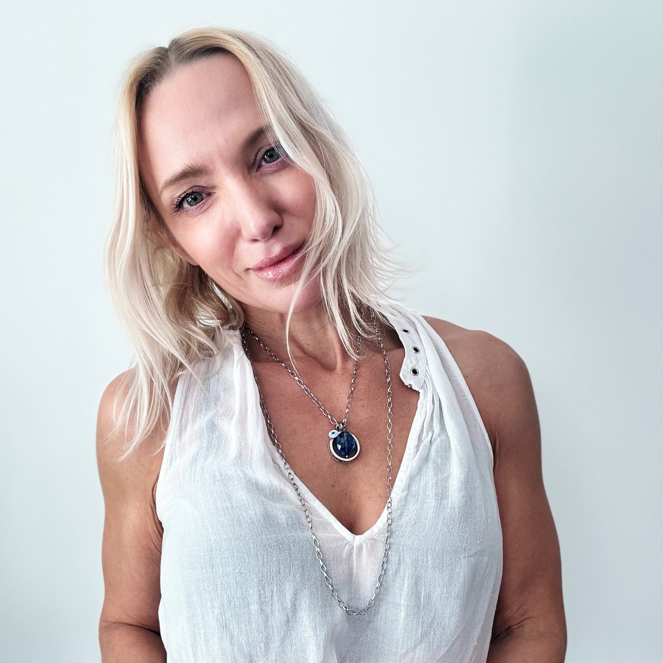 Katia Designs original gold necklace with clear AB crystals featuring "Remember Who the F*ck You Are" message, elegant and empowering.
