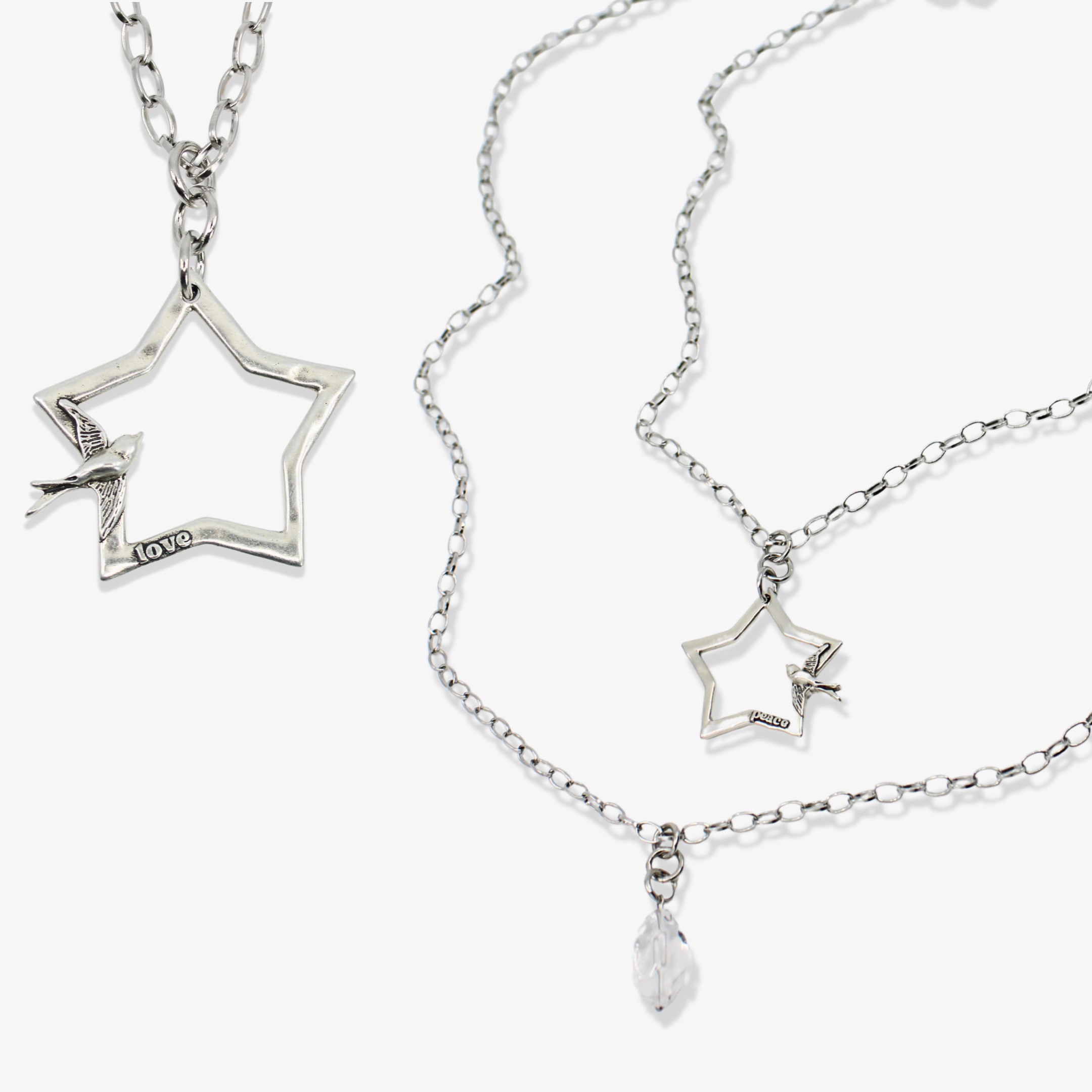 Katia Designs original Lite necklace featuring a gold-tone peace sign, star, and bird pendant with intricate detailing.