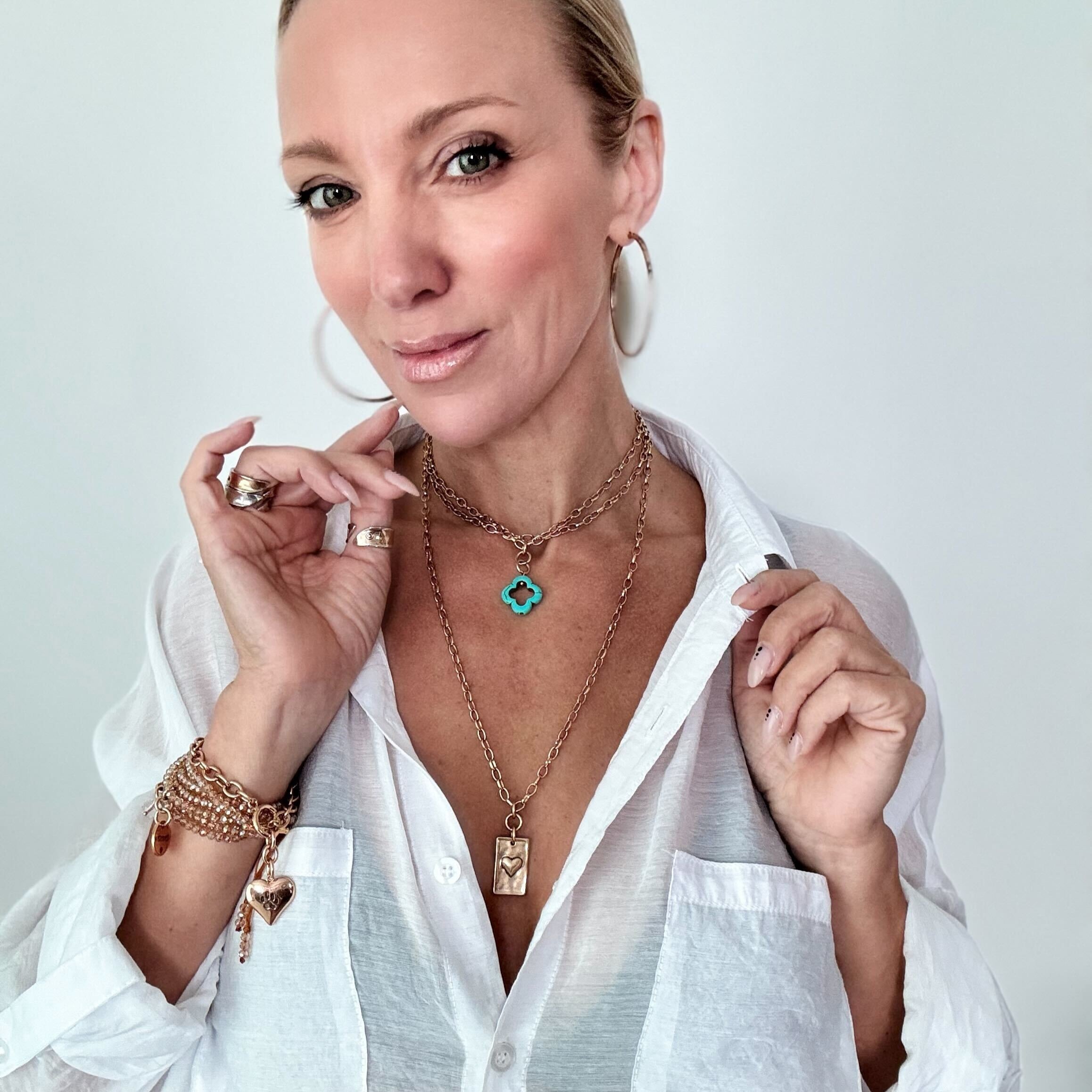 Katia Designs original lite necklace with smoky crystal, antique gold finish, featuring the "Take a Deep Breath and Let That Shit Go" pendant.
