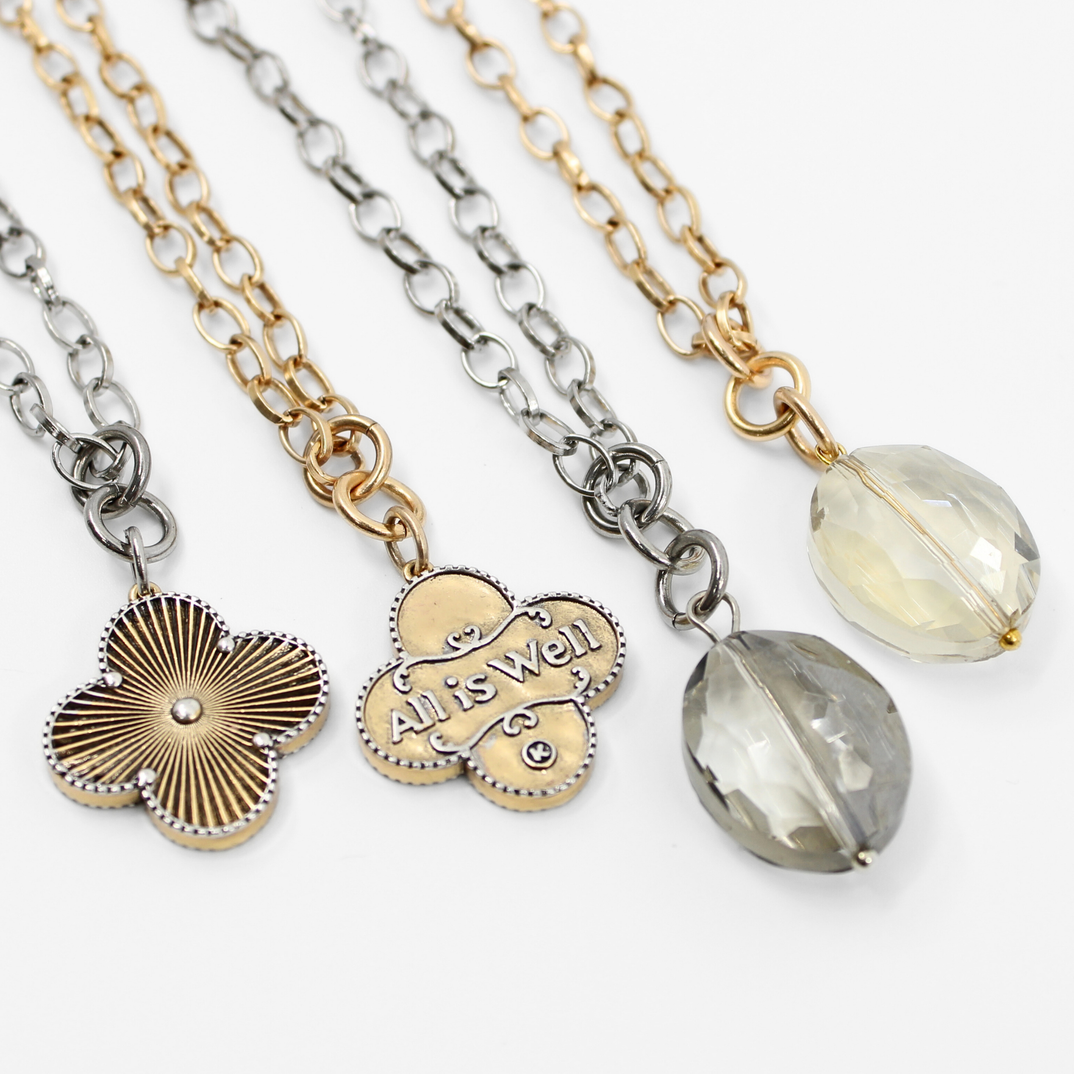 Katia Designs All is Well Clover Original Lite necklace with silver chain and smoky crystal pendant, elegant jewelry accessory.