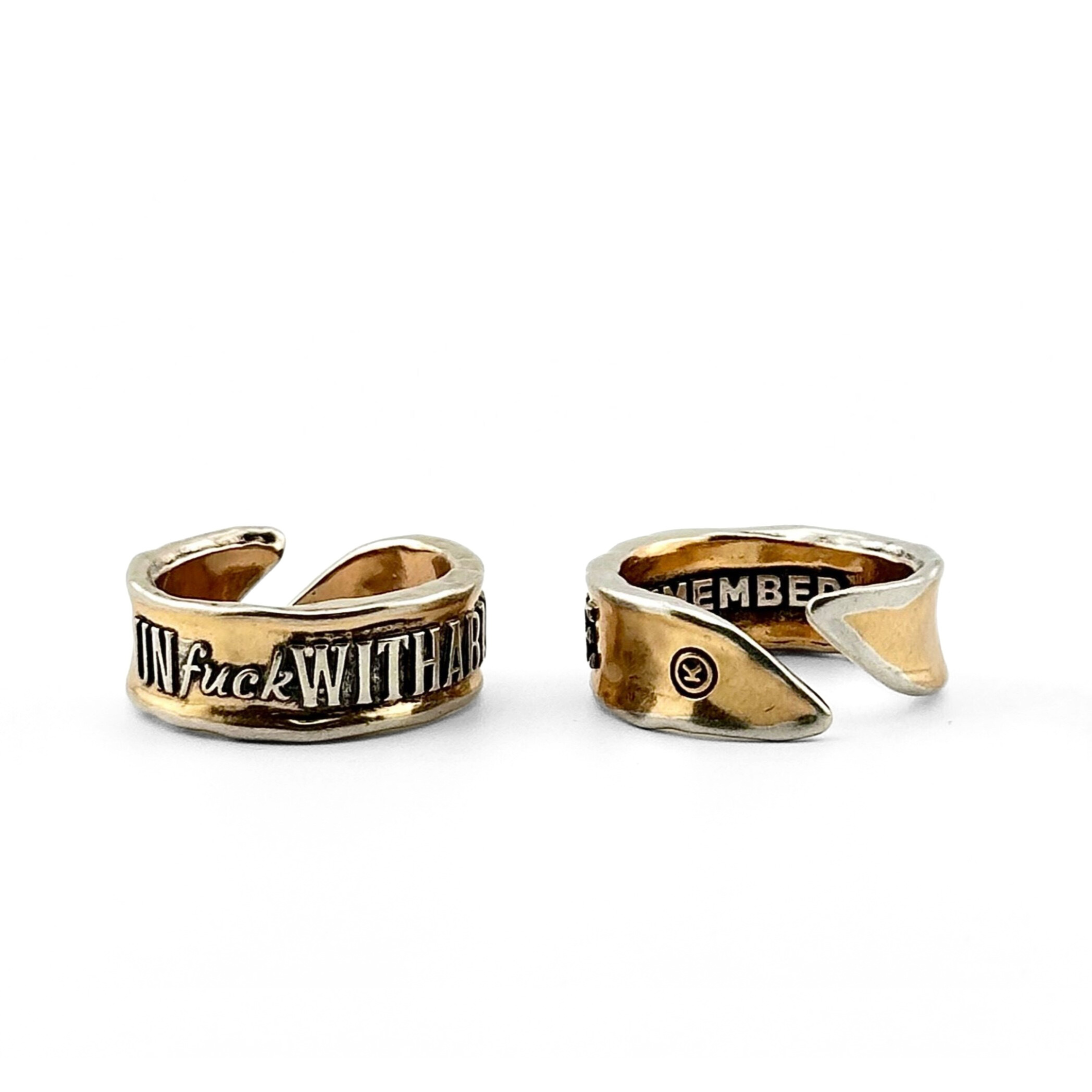 Katia Designs Unf*ckwithable Remember adjustable ring with bold engraved text, silver-toned metal, and a sleek, modern design.