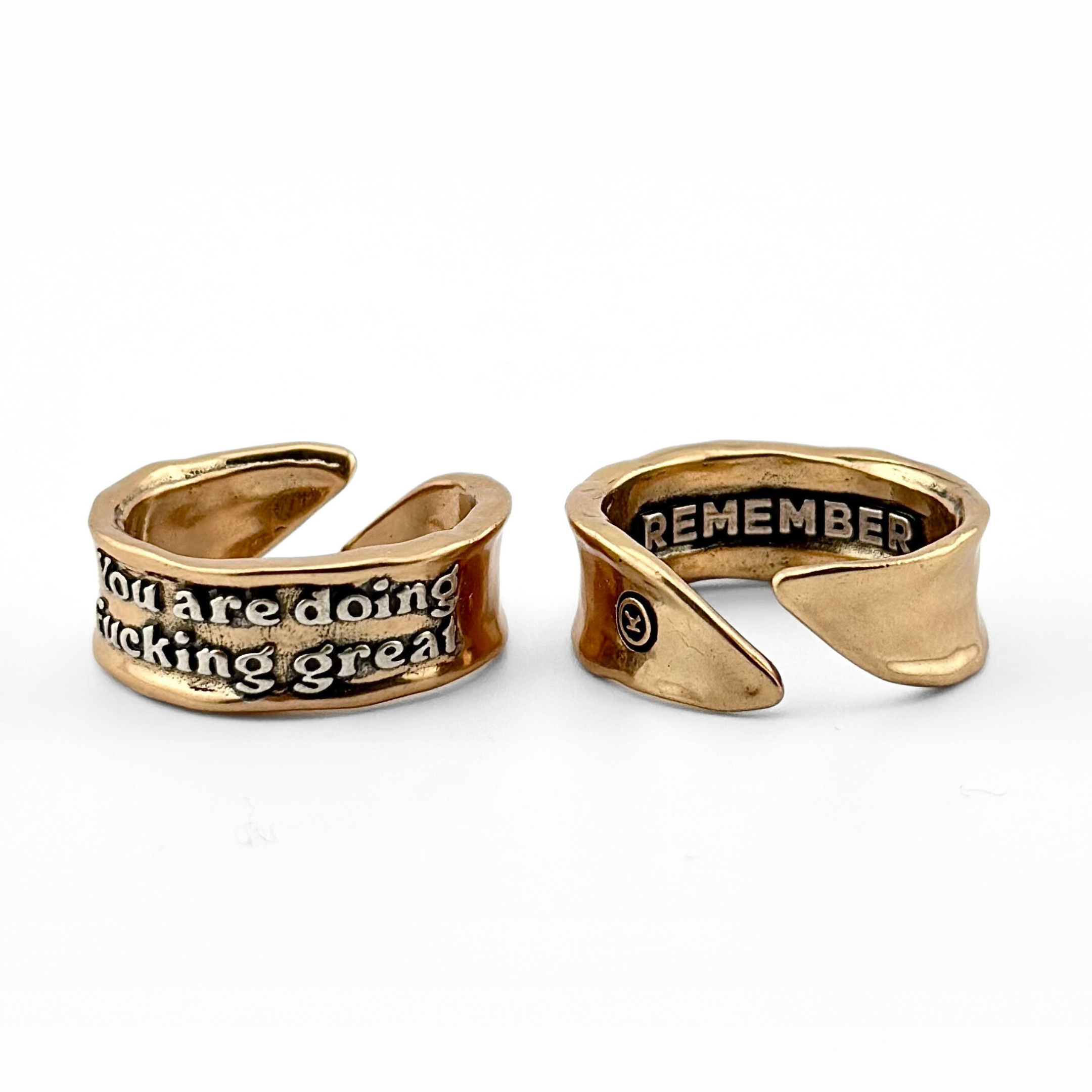 Katia Designs adjustable ring with bold "You Are Doing F*cking Great Remember" message, featuring a sleek silver finish.