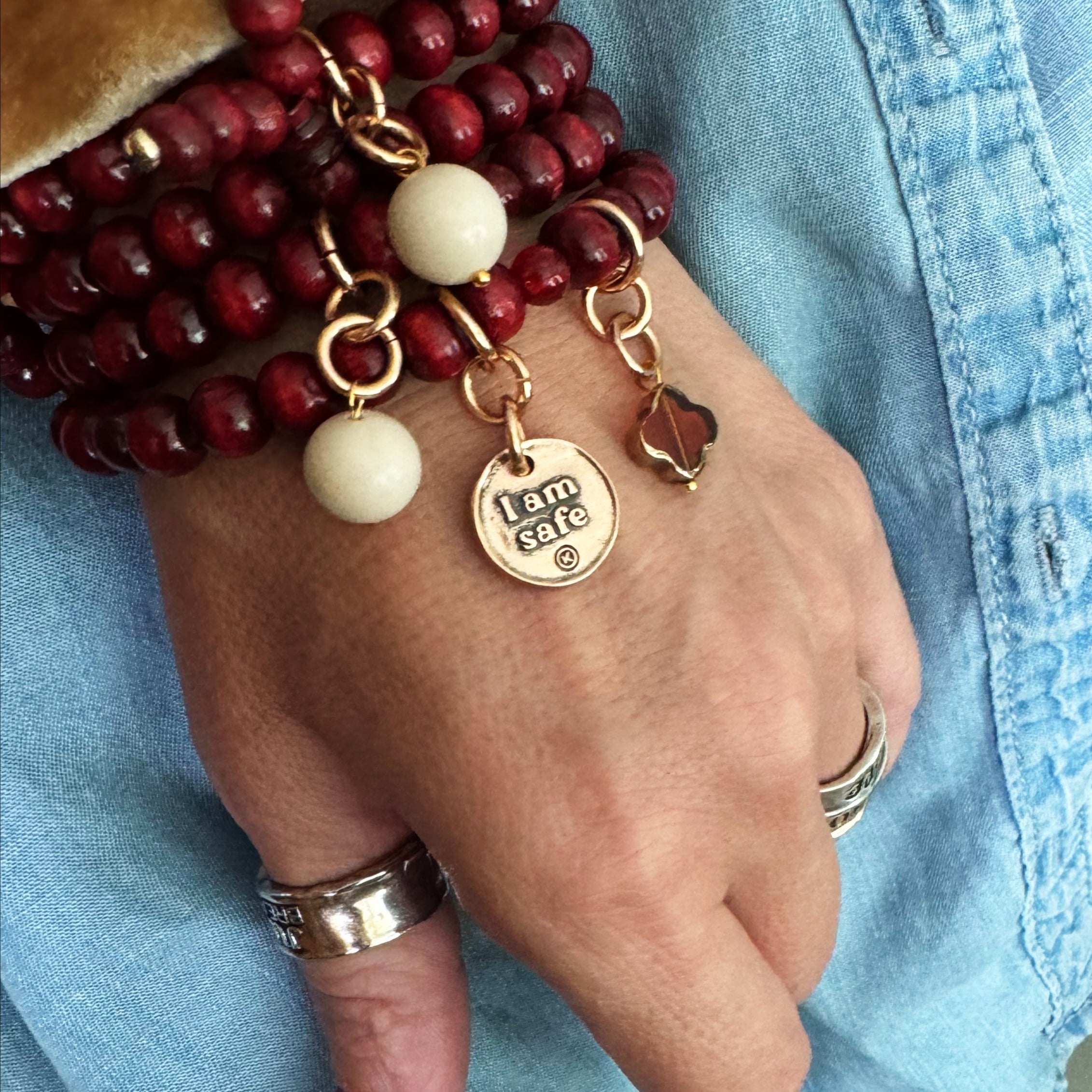Katia Designs I Am Safe Heart wood boho wrap bracelet and necklace with antique gold accents, featuring a heart pendant.