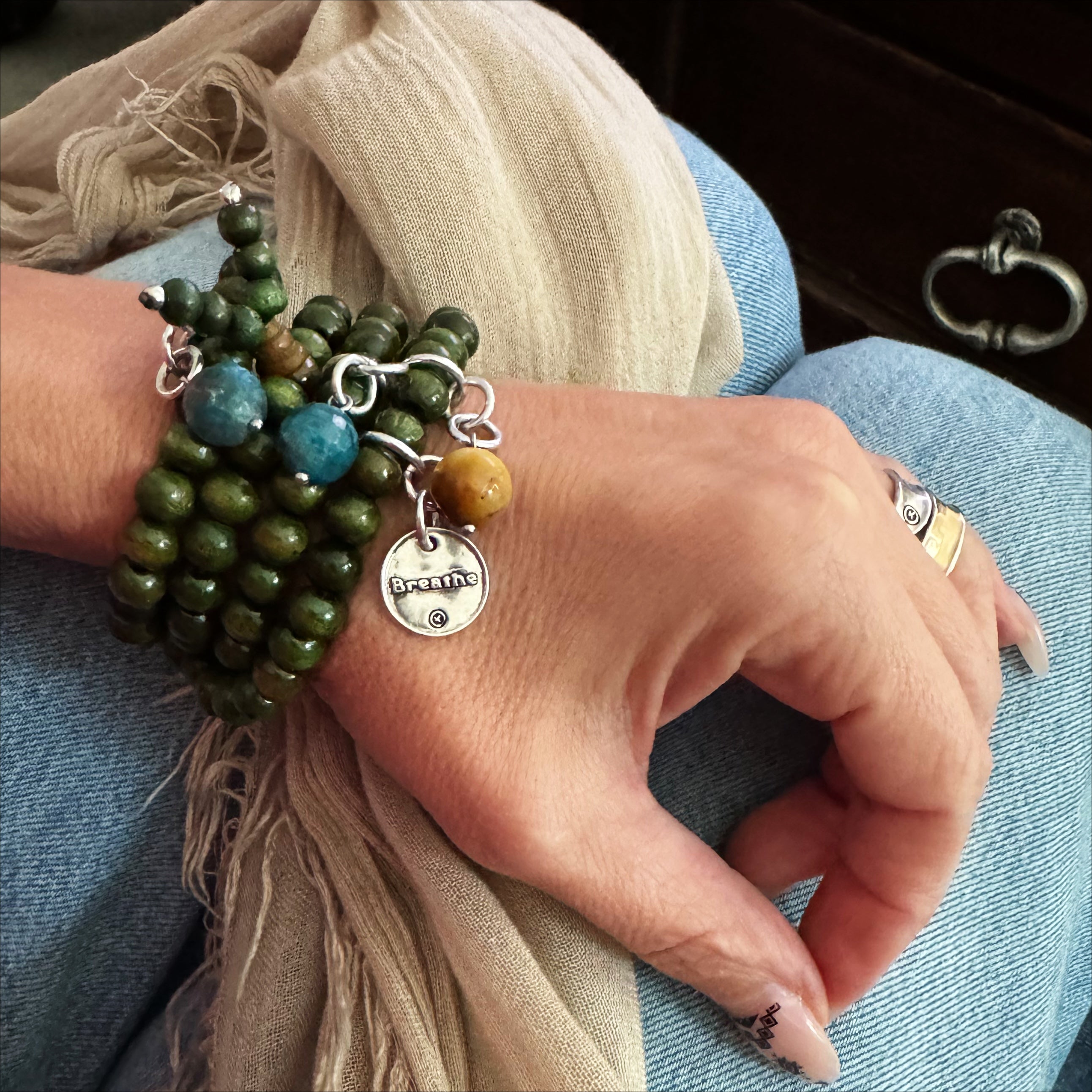 Katia Designs Breathe Heart Wood Boho Wrap Bracelet and Necklace featuring natural wood beads and a heart pendant.