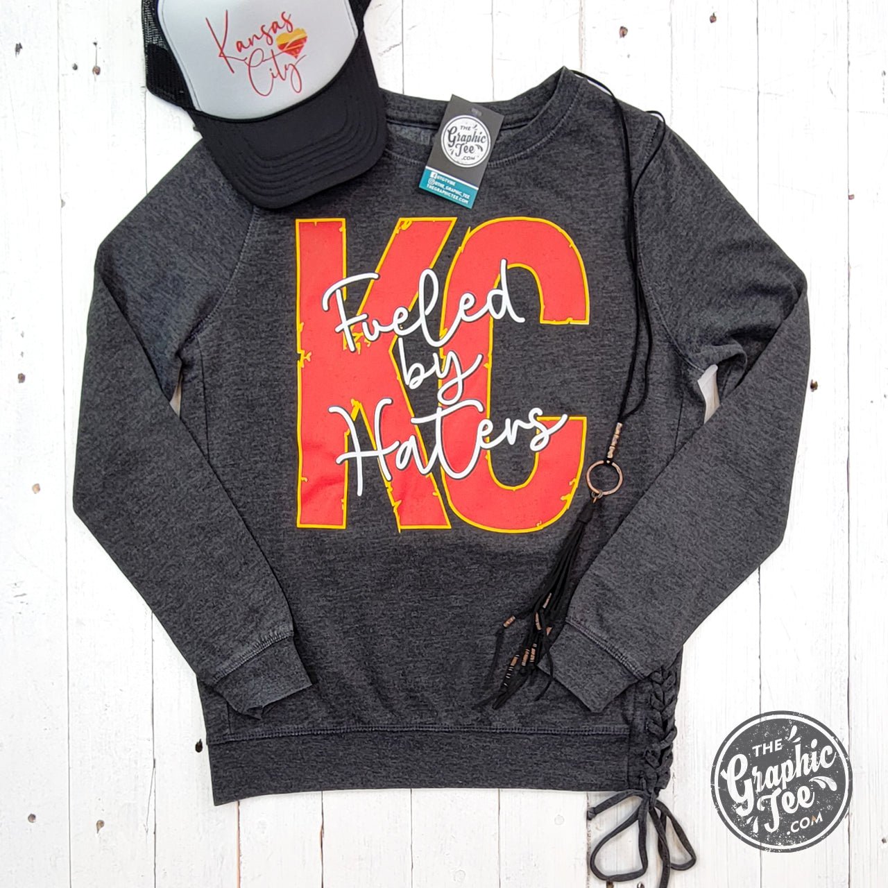 Mineral washed lace-up sweatshirt for women by The Graphic Tee, casual shirt with stylish design and comfortable fit.