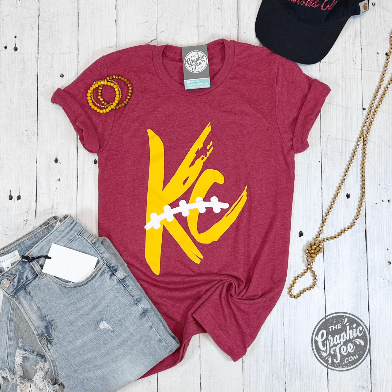 Red unisex short sleeve graphic tee from The Graphic Tee featuring KC Laces design and casual fit.