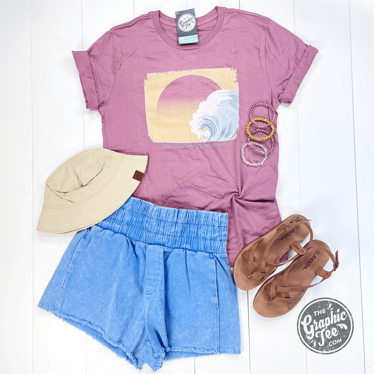 The Graphic Tee Let The Good Times Roll SS graphic t-shirt featuring colorful text and casual fit.
