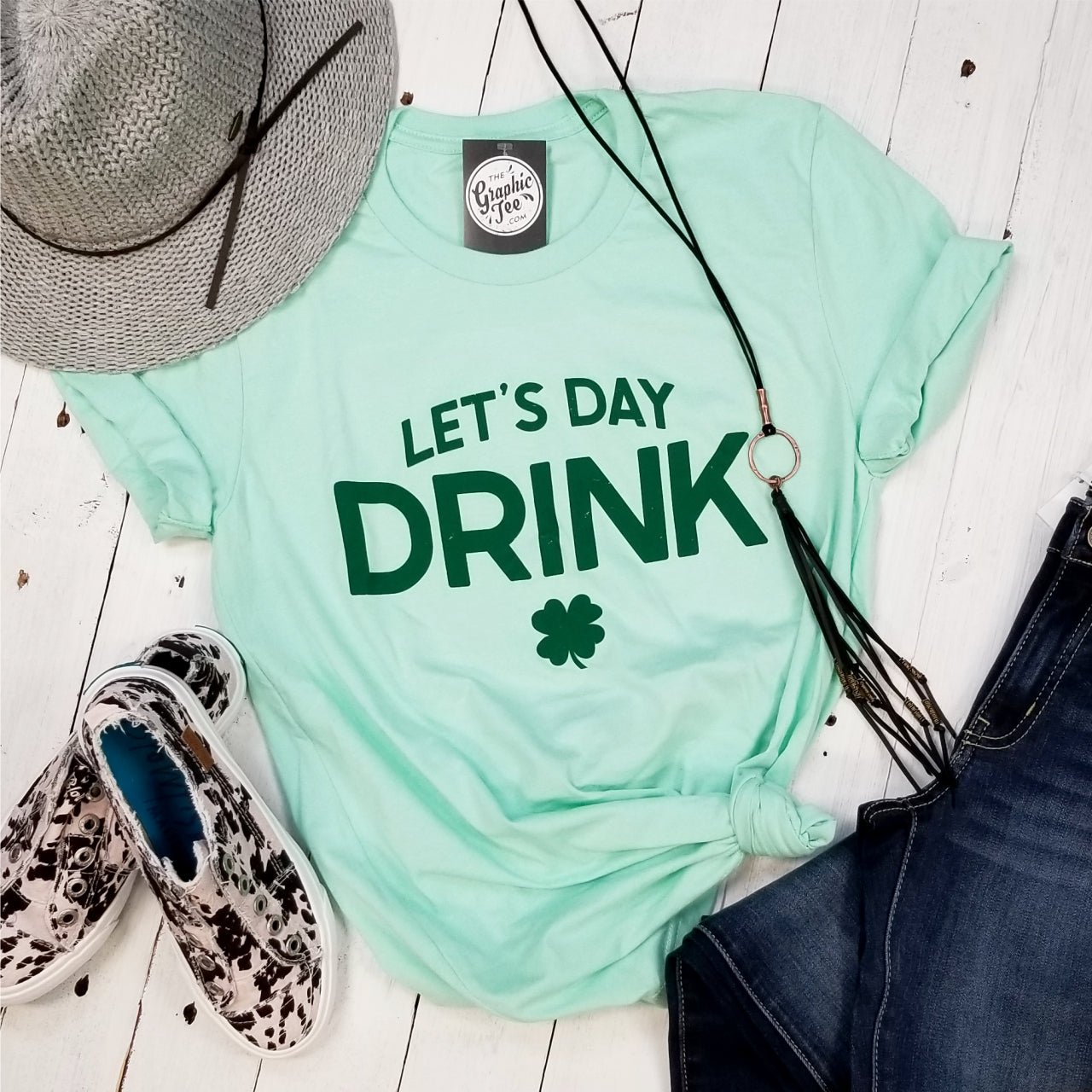 Let's Day Drink unisex graphic T-shirt by The Graphic Tee, featuring a casual short-sleeve design with a fun daytime drink print.