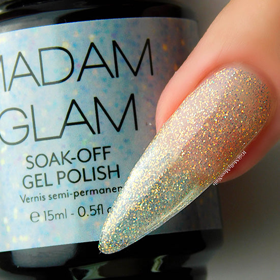 Madam Glam "Am I Clear?" nail polish bottle with clear cap and label, showcasing the product on a plain background.