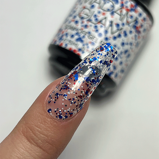 Madam Glam fireworks-themed nail polish display with vibrant, colorful fireworks design on the nail art.